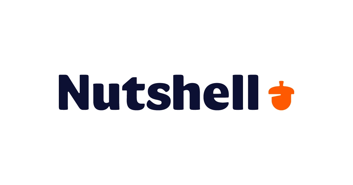Tulisan "Nutshell" dengan huruf besar dan tebal, diiringi dengan simbol biji kenari berwarna oranye, menciptakan identitas merek yang modern dan sederhana.