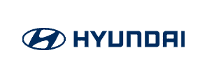 Logo Hyundai ditampilkan dengan jelas, menunjukkan identitas merek otomotif terkenal. Latar belakangnya berwarna biru, menambahkan kesan modern dan profesional.