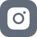 Ikon berbentuk lingkaran dengan kamera di tengah, menunjukkan fungsi media sosial untuk berbagi foto dan video di platform Instagram.