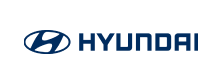 Logo Hyundai terletak di tengah, menampilkan desain yang sederhana dan modern. Identitas merek ini mencerminkan inovasi di industri otomotif.