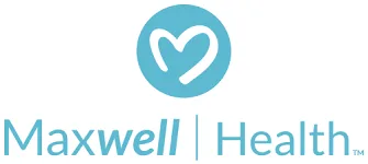 Logo Maxwell Health menampilkan simbol hati berwarna biru, mencerminkan fokus perusahaan pada kesehatan, dengan penekanan pada layanan yang berorientasi pada kesejahteraan.