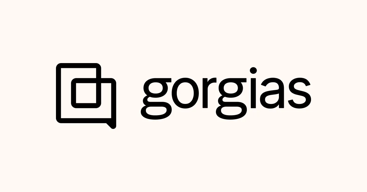 Logo Gorgias menampilkan simbol berbentuk kotak dialog dan teks, menciptakan citra merek yang modern dan bersahabat, cocok untuk platform dukungan pelanggan.